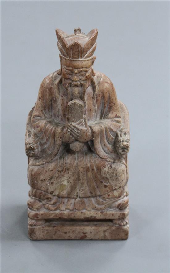 A Chinese stone carving of an immortal, possibly 19th century, height 19.5cm